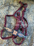 Floral Tooled Black Noseband on Maroon Muletape Halter
